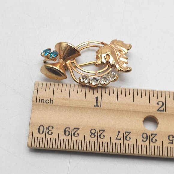 Vintage Gold Tone Brooch With Blue Clear Rhinestones Bow Leaf Design - Picture 4 of 4